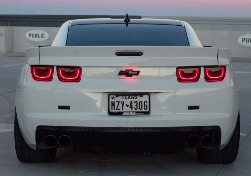 Oracle 10-13 Chevy Camaro LED TL 2.0 tail lights in red, showcasing pre-assembled halo rings for enhanced visibility.