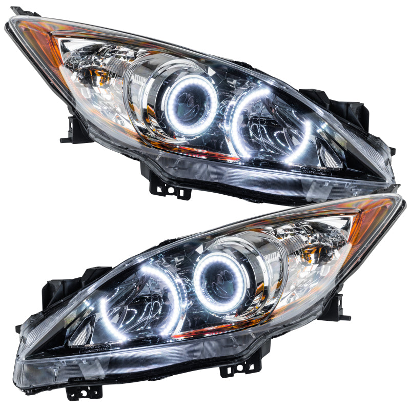Oracle 10-13 Mazda 3 SMD HL Halogen headlights with halo rings in Chrome and Black housing options.