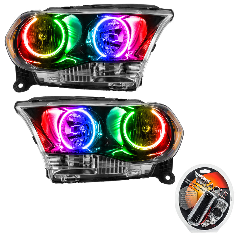 Oracle 11-13 Dodge Durango SMD HL Halogen headlights in black housing with ColorSHIFT technology, showcasing halo rings and sleek design.