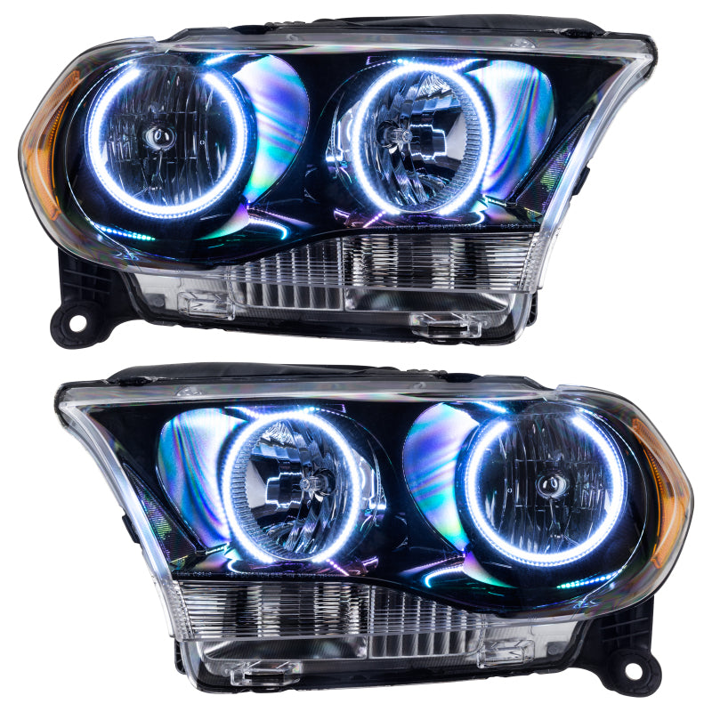 Oracle 11-13 Dodge Durango SMD HL Halogen headlights with black housing and halo rings, showcasing modern automotive lighting design.