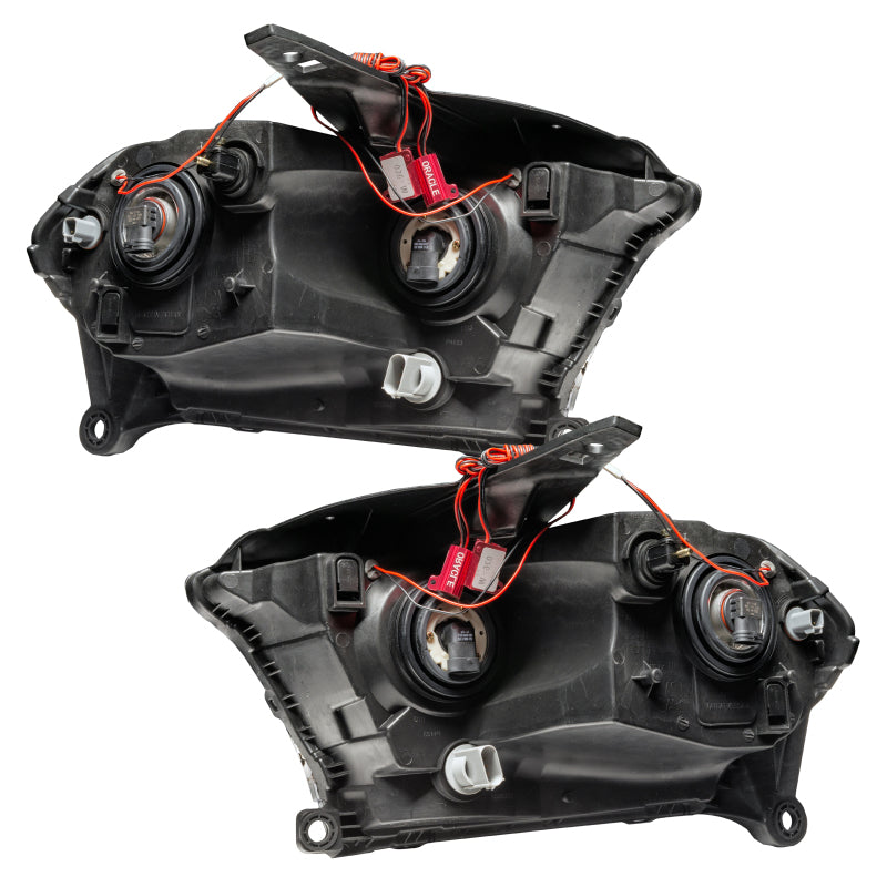 Oracle 11-13 Dodge Durango SMD HL Halogen headlights with chrome housing and blue halo rings, showcasing a modern design for enhanced visibility.