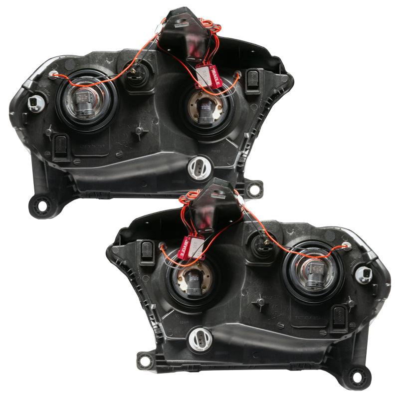 Oracle 11-13 Dodge Durango SMD HL Halogen headlights with chrome housing and blue halo rings, showcasing a modern design for enhanced visibility.