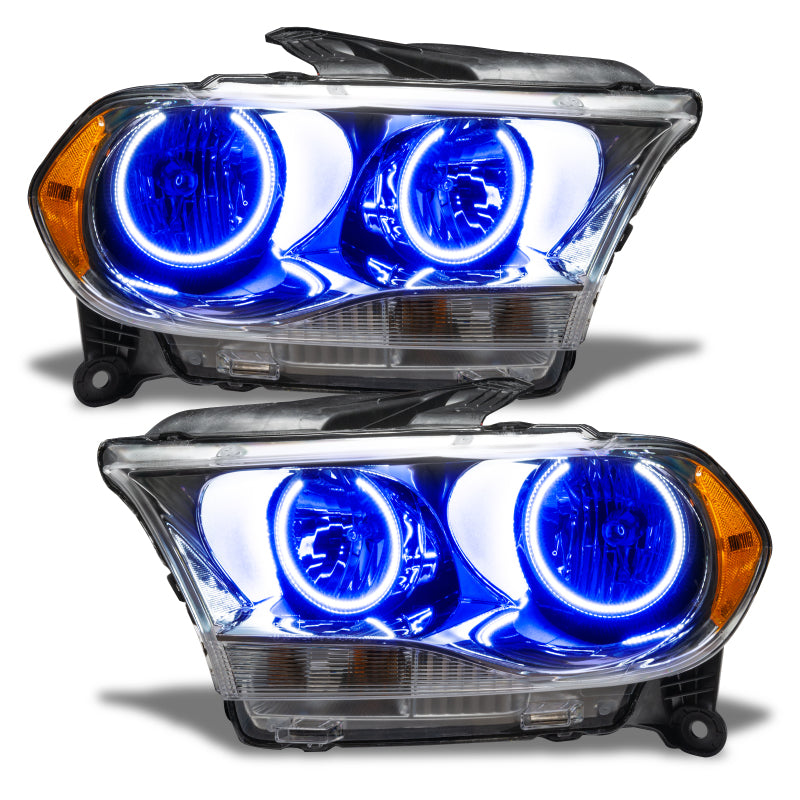 Oracle 11-13 Dodge Durango SMD HL Halogen headlights with chrome housing and blue halo rings, showcasing a modern design for enhanced visibility.