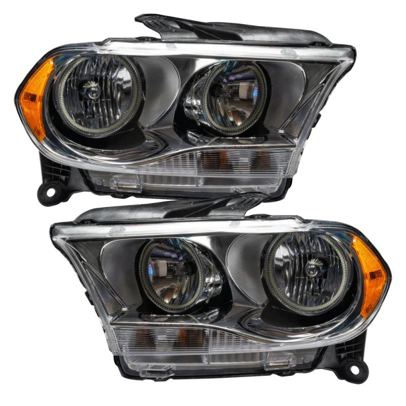 Oracle 11-13 Dodge Durango SMD HL Halogen headlights with chrome housing and blue halo rings, showcasing a modern design for enhanced visibility.