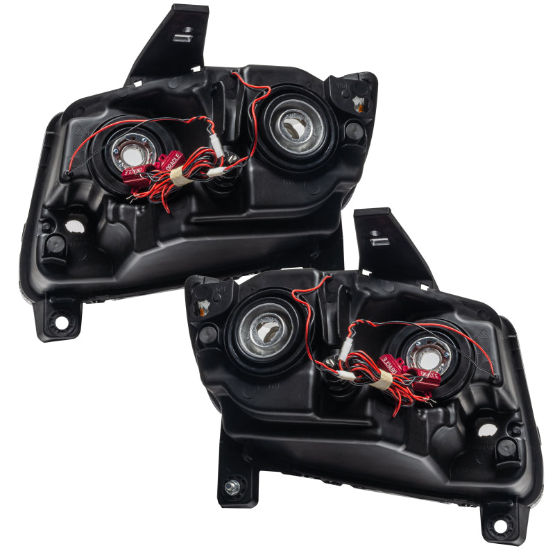 Oracle 11-13 Jeep Grand Cherokee SMD headlights with chrome housing and halo rings, showcasing a modern design for enhanced visibility.