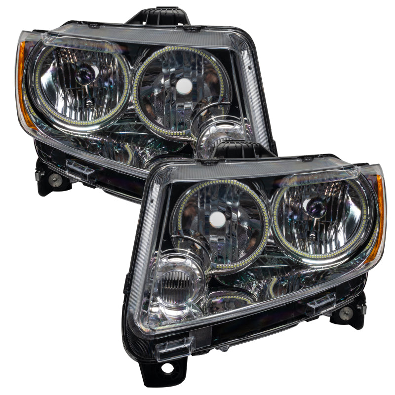 Chrome ORACLE SMD headlights for 2011-2013 Jeep Grand Cherokee with halo rings installed.