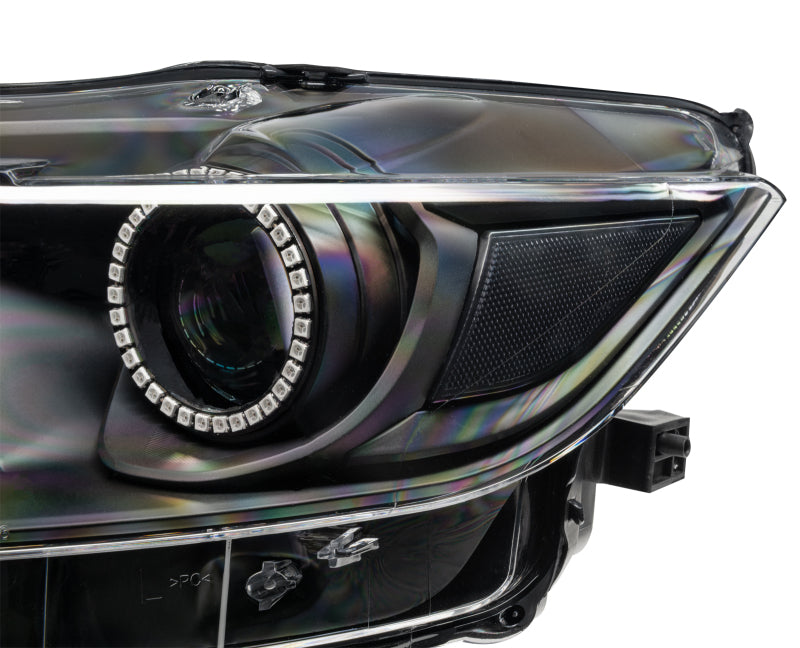 Oracle Dynamic RGB+A headlights for 2015-2017 Ford Mustang with blacked-out housing and colorful LED features.