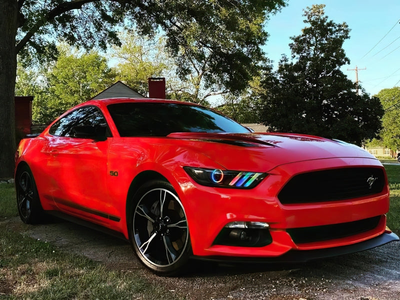 Oracle Dynamic RGB+A headlights for 2015-2017 Ford Mustang with blacked-out housing and colorful LED features.