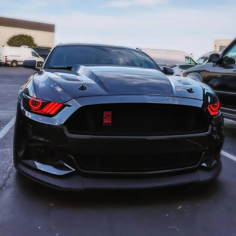 Oracle Dynamic RGB+A headlights for 2015-2017 Ford Mustang with blacked-out housing and colorful LED features.