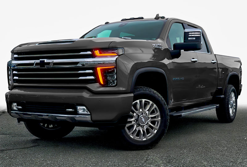 Oracle RGB+W Headlight DRL Upgrade for 2020-2021 Chevy Silverado HD, showcasing vibrant color options and sleek design.