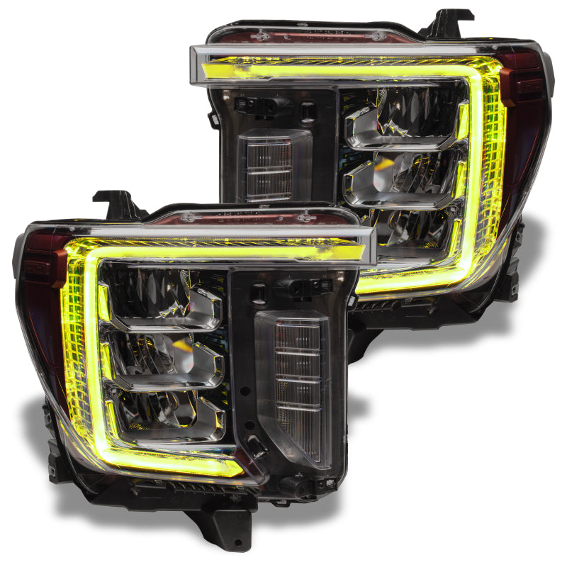 Oracle RGB+W Headlight DRL Upgrade Kit for 2020-2021 GMC Sierra 2500/3500 HD, showcasing vibrant color options and sleek design.