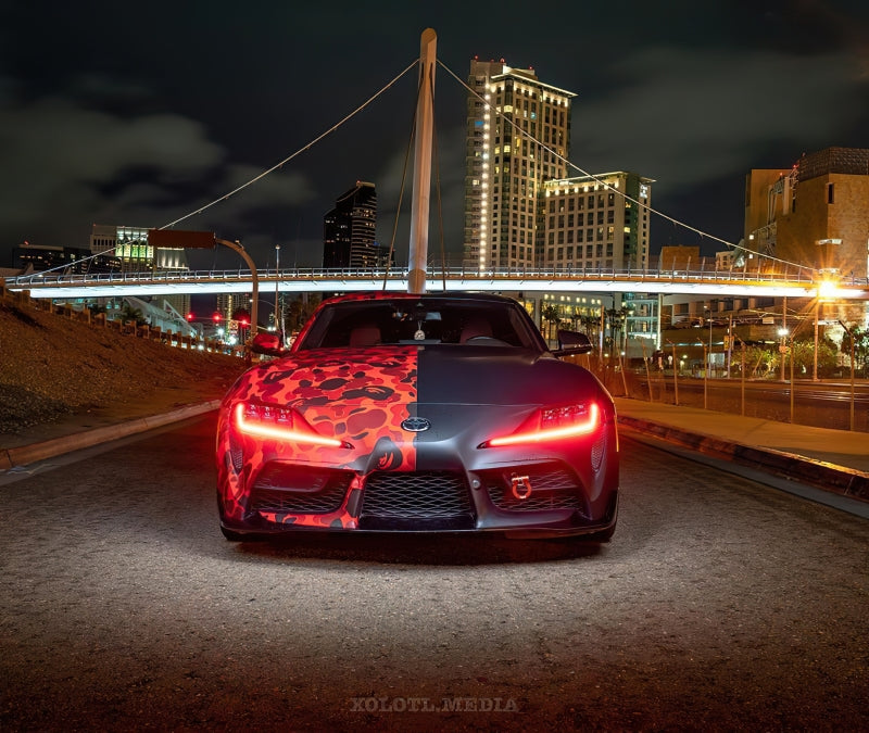 Oracle RGB+A DRL Upgrade Kit for 2020-2021 Toyota Supra GR, showcasing colorful LED lights and circuit board design.