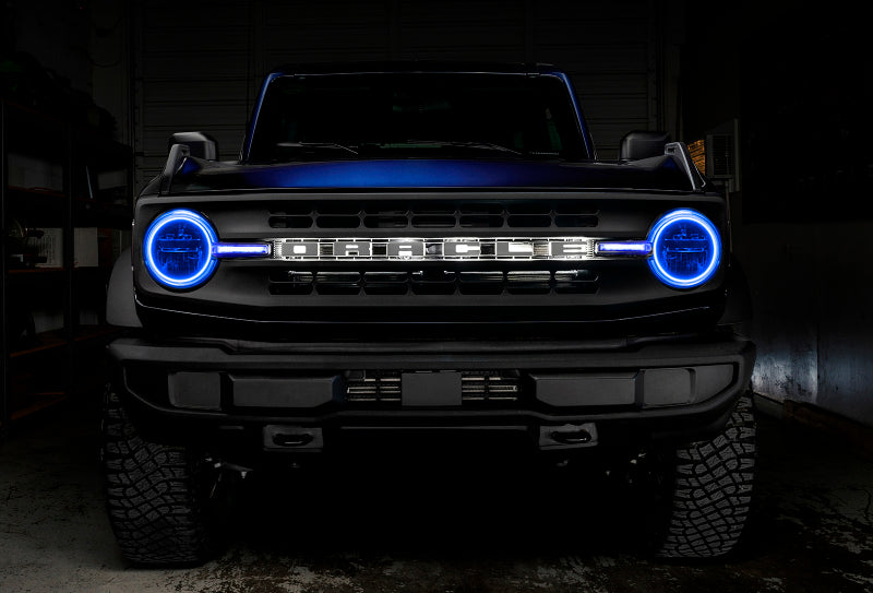 Oracle 21-22 Ford Bronco Headlight Halo Kit with DRL Bar showcasing vibrant LED colors and sleek design.