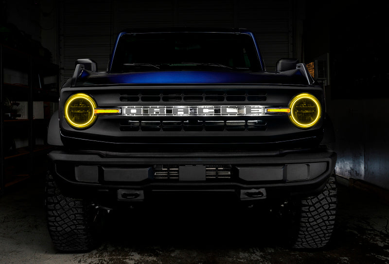 Oracle 21-22 Ford Bronco Headlight Halo Kit with DRL Bar showcasing vibrant LED colors and sleek design.