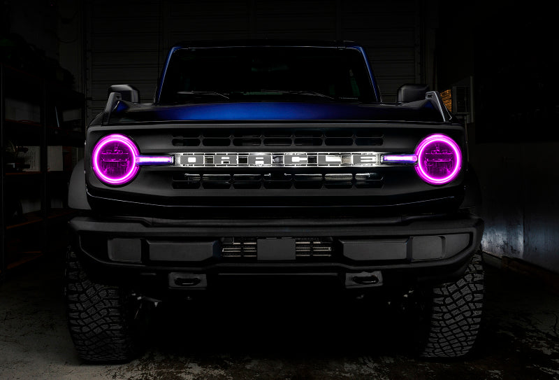 Oracle 21-22 Ford Bronco Headlight Halo Kit with DRL Bar showcasing vibrant LED colors and sleek design.