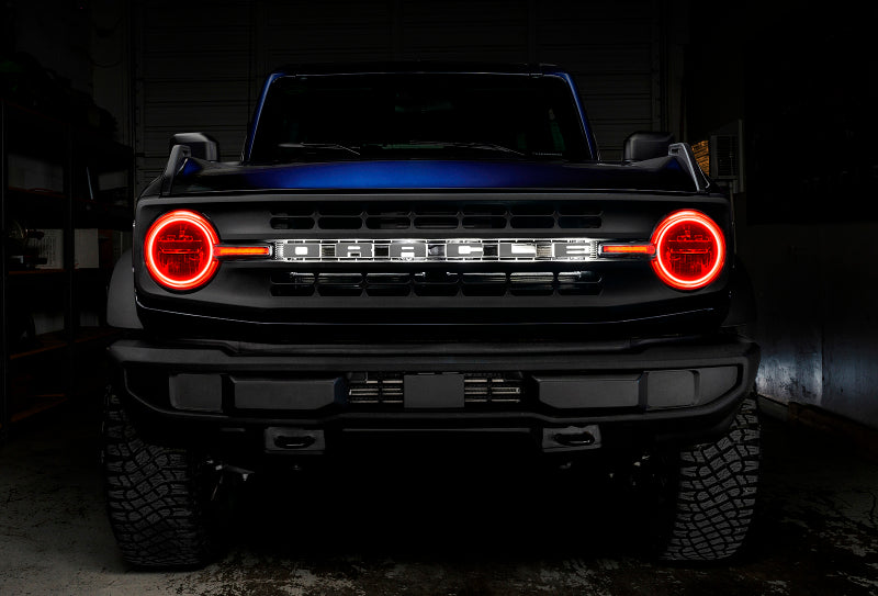 Oracle 21-22 Ford Bronco Headlight Halo Kit with DRL Bar showcasing vibrant LED colors and sleek design.