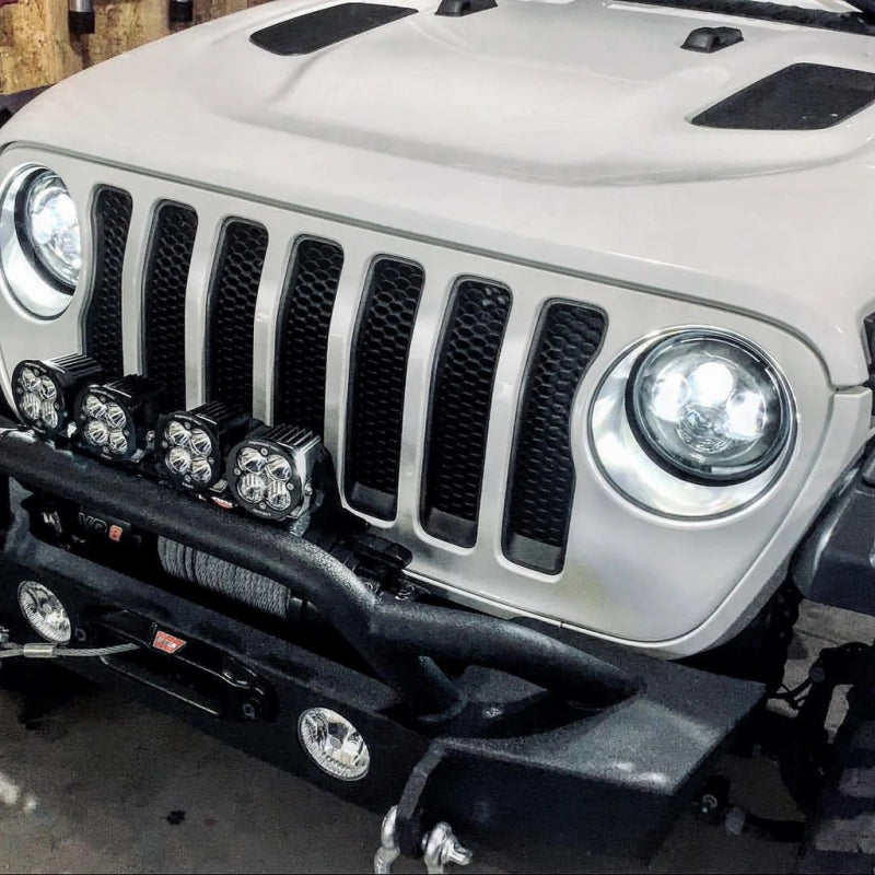 Oracle 7in High Powered LED Headlights with black bezel and customizable color halos, designed for Jeep Wranglers and off-road vehicles.