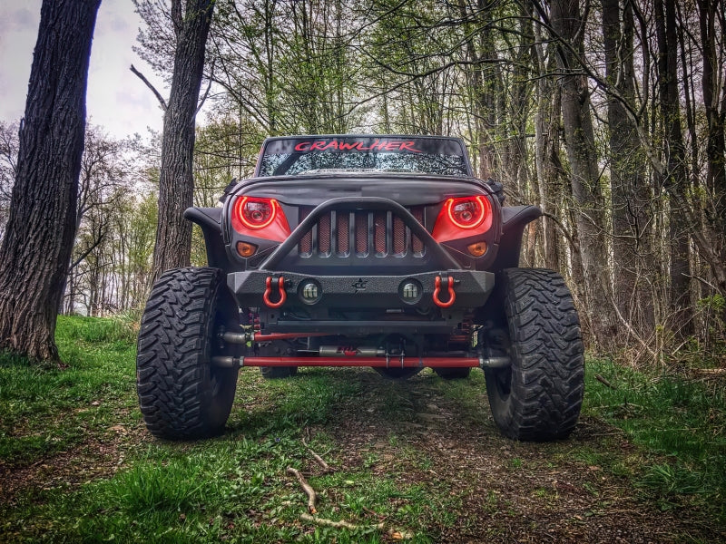 Oracle 7in High Powered LED Headlights with black bezel, showcasing dynamic color features and rugged design for Jeep Wrangler and off-road vehicles.