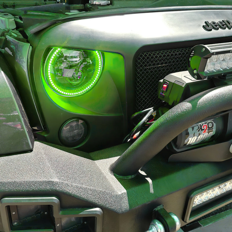 Oracle 7in High Powered LED Headlights with black bezel, showcasing dynamic color features and rugged design for Jeep Wrangler and off-road vehicles.