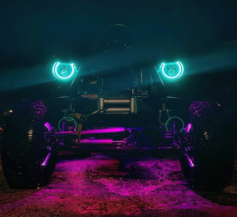 Oracle 7in High Powered LED Headlights with black bezel, showcasing dynamic color features and rugged design for Jeep Wrangler and off-road vehicles.