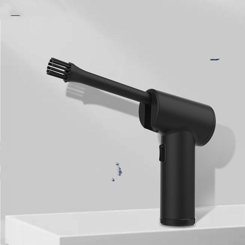 Portable Electric Wireless Dust Blower in black, designed for cleaning cars and home electronics, includes a brush and data cable.