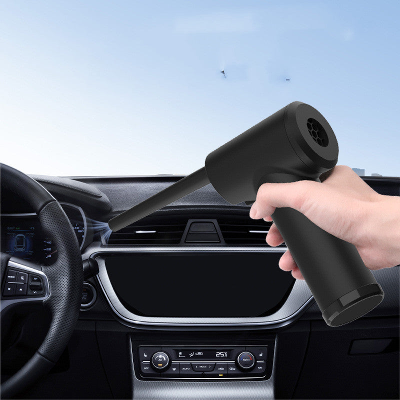 Portable Electric Wireless Dust Blower in black, designed for cleaning cars and home electronics, includes a brush and data cable.