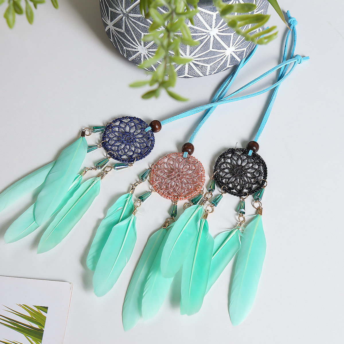 Small Fresh Feather Dream Catcher pendant for car rearview mirror, featuring delicate feathers and Nordic design.