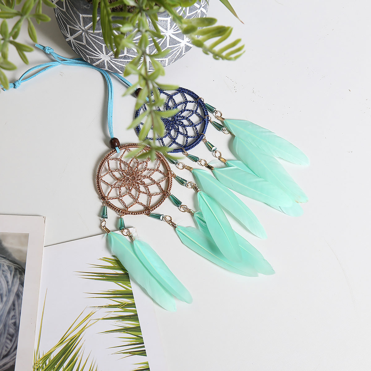 Small Fresh Feather Dream Catcher pendant for car rearview mirror, featuring delicate feathers and Nordic design.