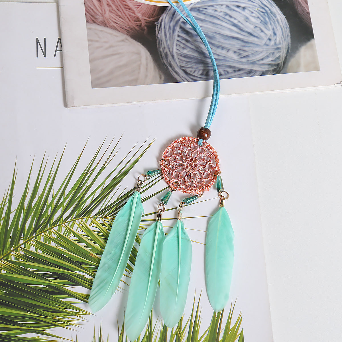 Small Fresh Feather Dream Catcher pendant for car rearview mirror, featuring delicate feathers and Nordic design.