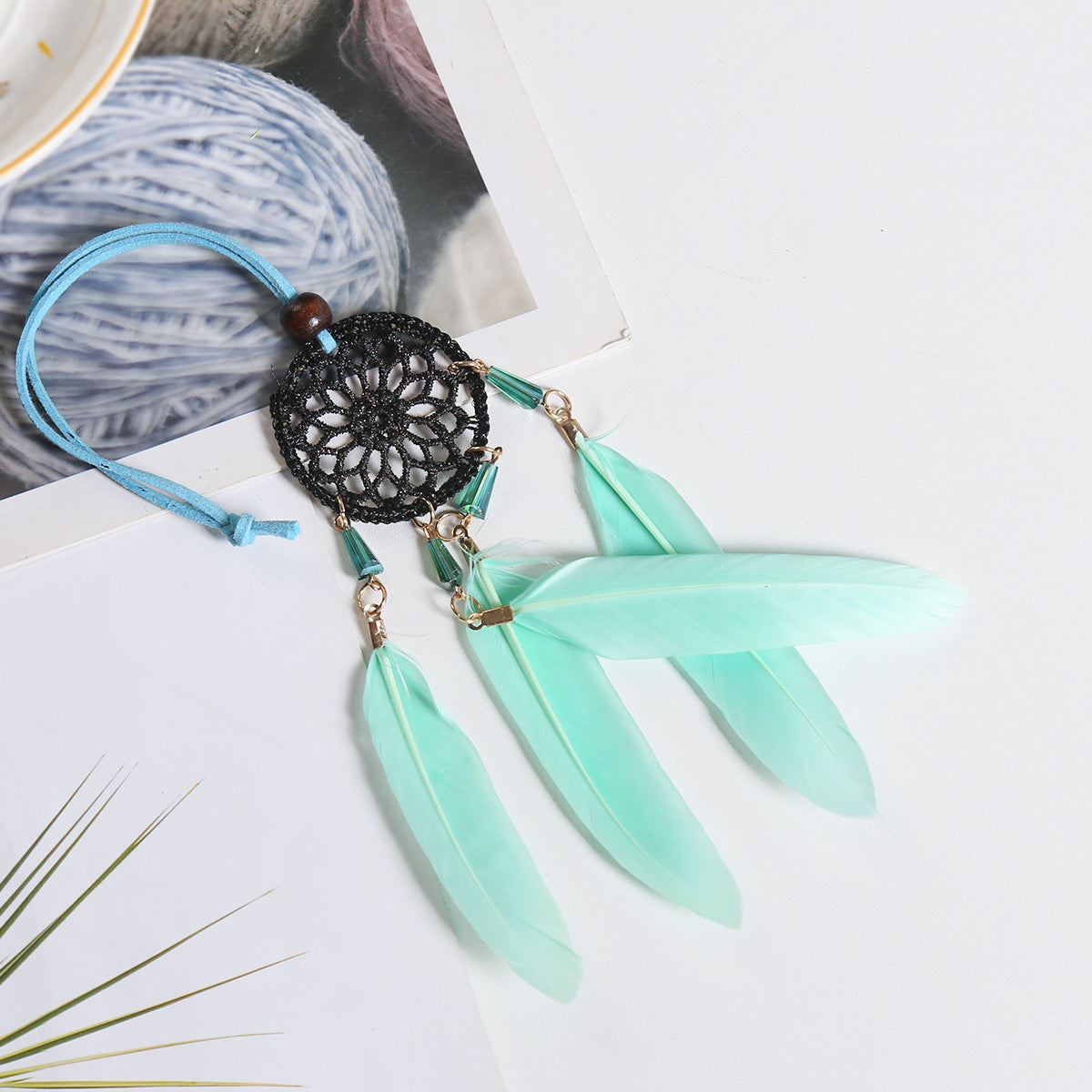 Small Fresh Feather Dream Catcher pendant for car rearview mirror, featuring delicate feathers and Nordic design.