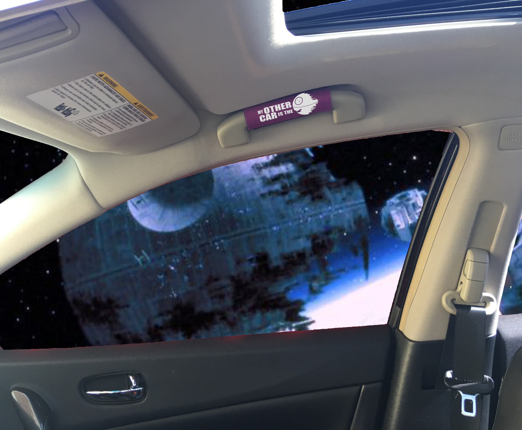 The DeathStar Grip 2 featuring smooth artwork and a soft base, designed for vehicle interiors.