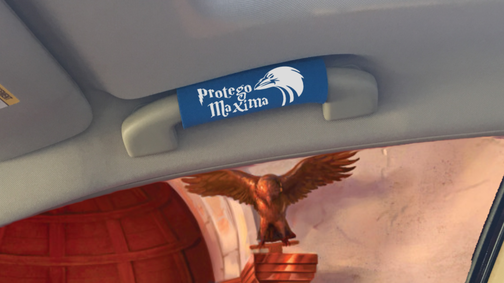 The Raven Grip featuring smooth artwork and a super-soft base, designed for comfort and style in vehicles.