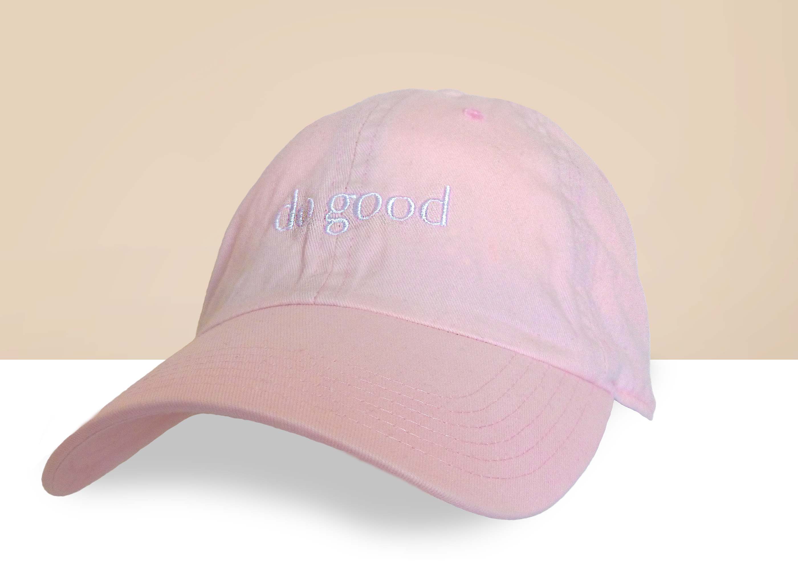 Stylish Sittin' Pretty Pink baseball hat with adjustable strap and 'Do Good' embroidery.