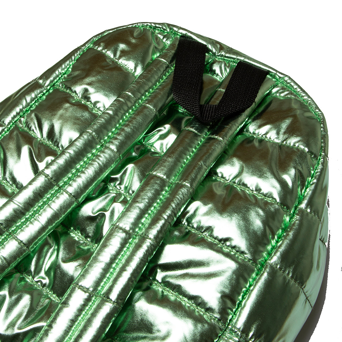 Biggdesign Moods Up Lucky Glitzer Rucksack featuring a shiny metallic design, spacious compartments, and a vibrant green color symbolizing luck.