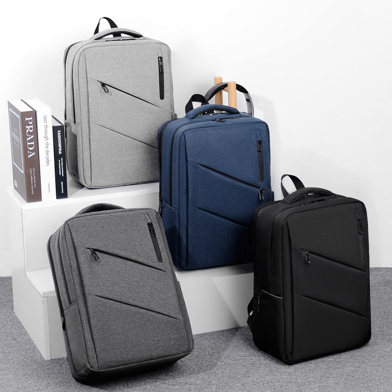 A stylish and multifunctional business backpack for men, featuring waterproof Oxford material, USB charging port, and multiple interior pockets.