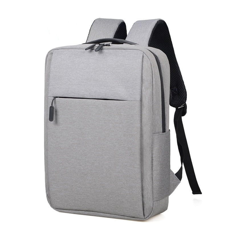 Business Backpack for Men featuring USB charging port, made of durable Oxford material, with spacious interior and soft straps.