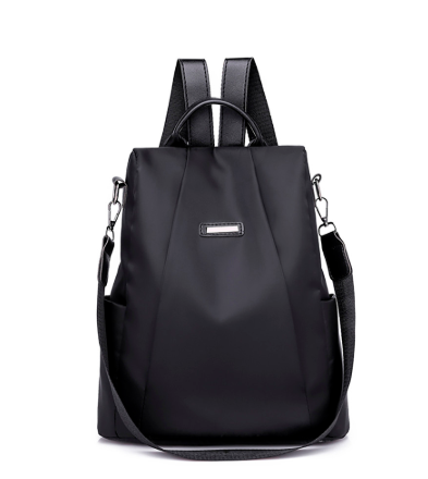 A stylish Canvas Travel Waterproof Oxford Backpack in a sleek design, showcasing its durable fabric and spacious compartments.