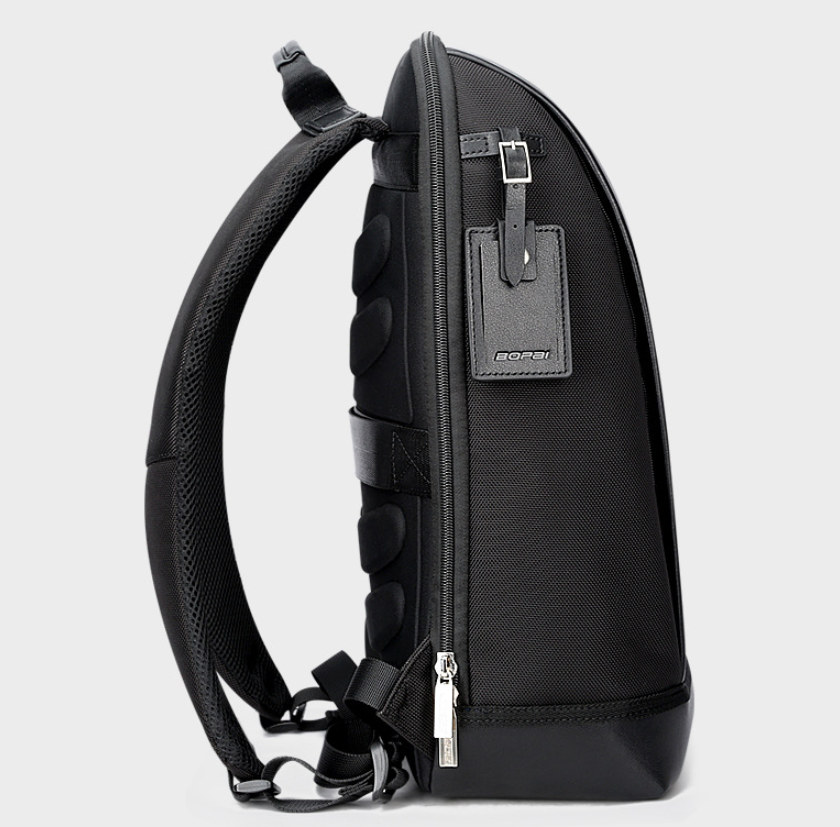 Casual black backpack for men featuring adjustable shoulder straps and durable microfiber PU leather material.