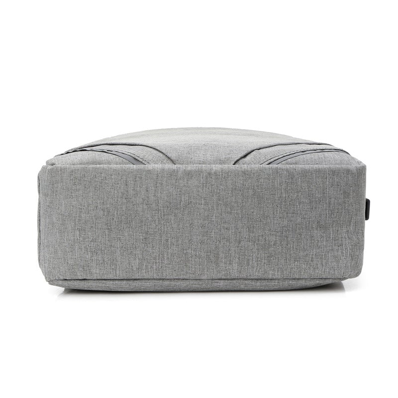 Casual computer backpack for men and women, featuring a sleek design, durable polyester material, and multiple pockets for organization.