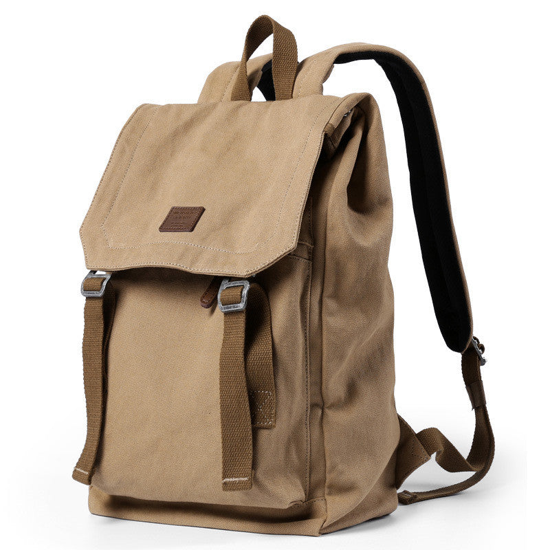 Casual Fashion Canvas Backpack in plain design, suitable for men and women, featuring multiple pockets and durable canvas material.