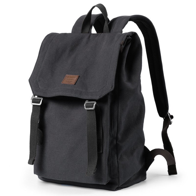 Casual Fashion Canvas Backpack in plain design, suitable for men and women, featuring multiple pockets and durable canvas material.