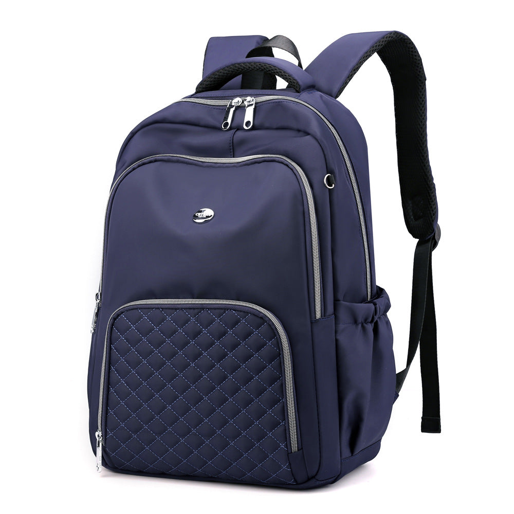 Casual Fashion Korean Version Oxford Cloth Small Backpack in solid color, showcasing its stylish design and functional compartments.