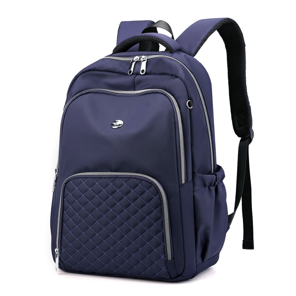 Casual Fashion Korean Version Oxford Cloth Small Backpack in solid color, showcasing its stylish design and functional compartments.