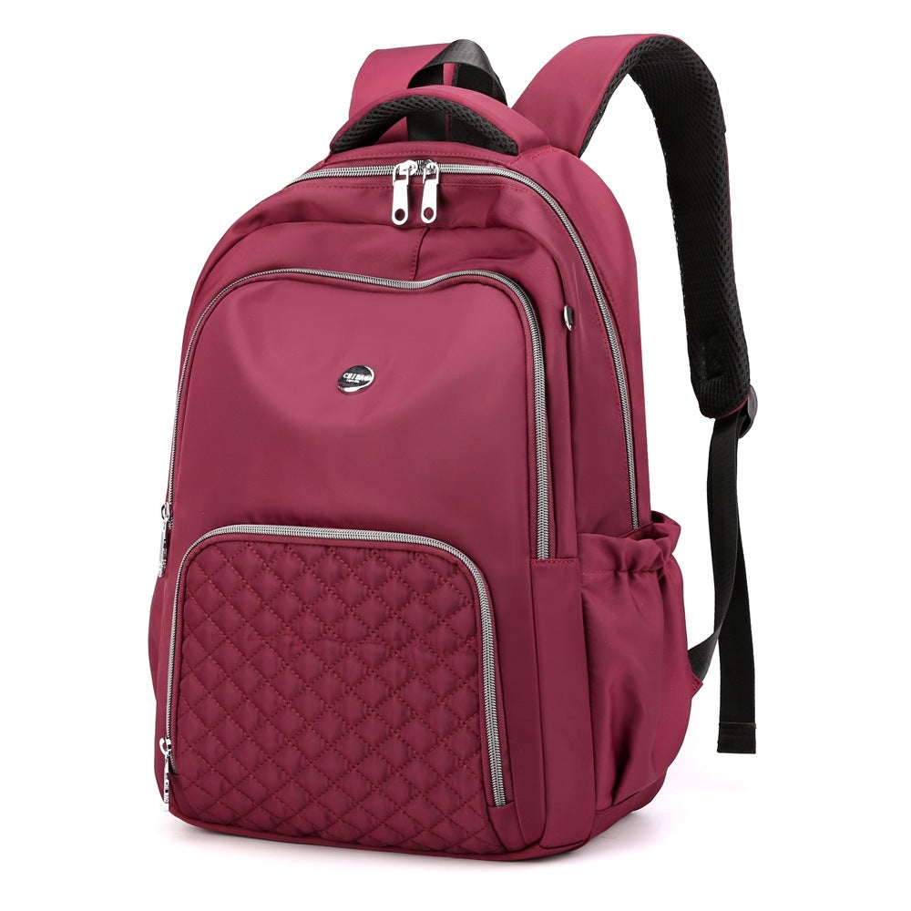 Casual Fashion Korean Version Oxford Cloth Small Backpack in solid color, showcasing its stylish design and functional compartments.