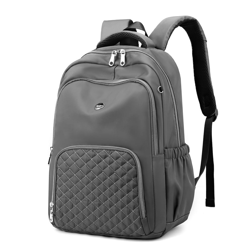 Casual Fashion Korean Version Oxford Cloth Small Backpack in solid color, showcasing its stylish design and functional compartments.