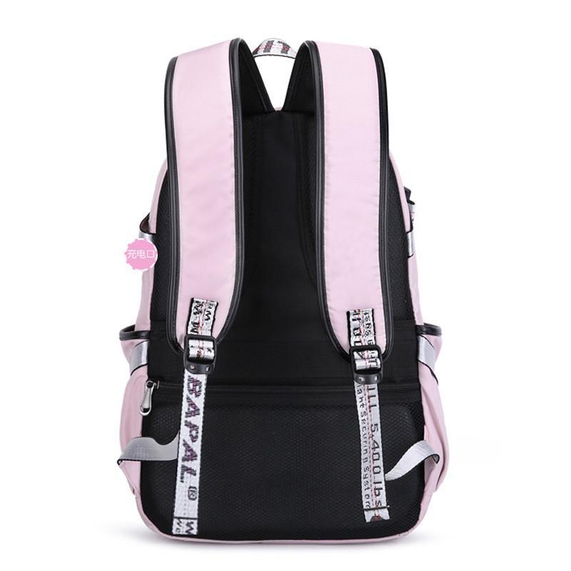 Casual laptop backpack for women featuring a USB charging port, made of durable polyester, with a stylish design and spacious compartments.