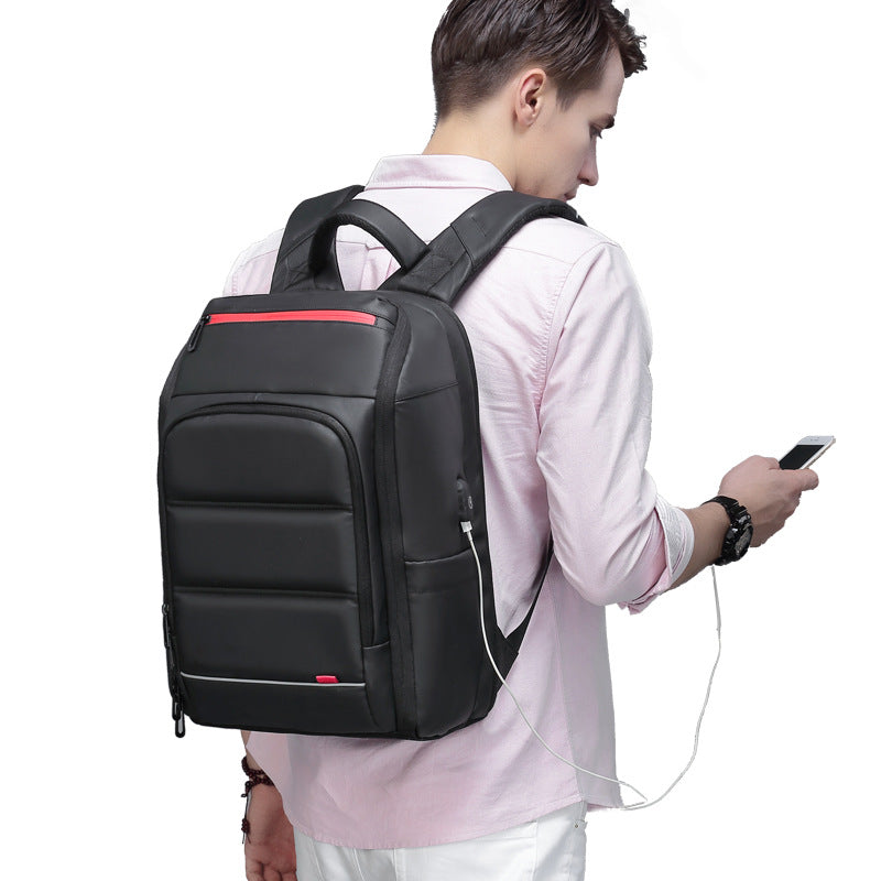Stylish computer backpack for men and women with USB charging port, featuring multiple pockets and a sleek black design.