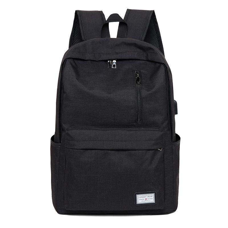 Fashion Business Backpack made of durable Oxford cloth with USB charging interface, featuring a zipper opening and spacious compartments.