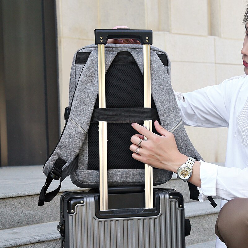 Fashion Men's Backpack made of waterproof Oxford cloth, featuring a large capacity and reflective stripe, ideal for business and casual use.