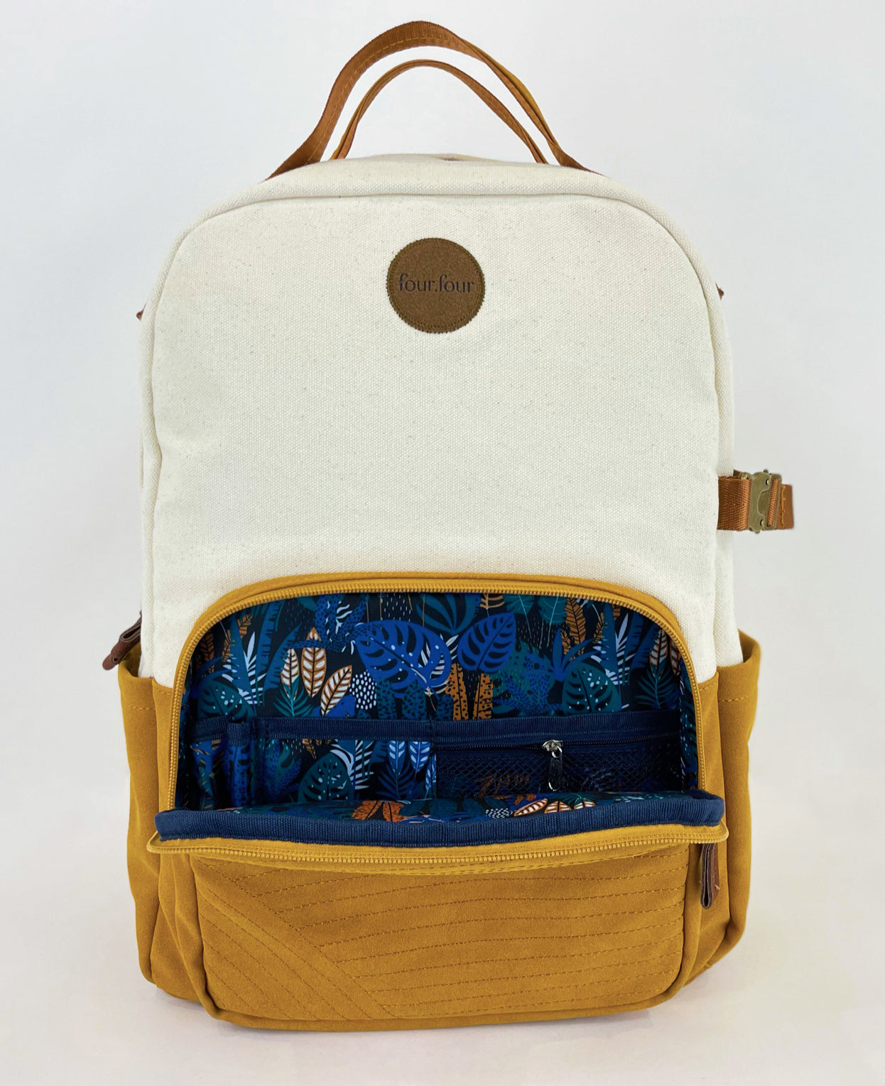 Good To Go Backpack in Bliss Curry/Cream, featuring a stylish design with multiple pockets and a padded laptop compartment.